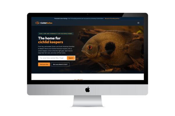 Cichlid Nation homepage shown on a desktop monitor, designed by Pesce MediaWorks